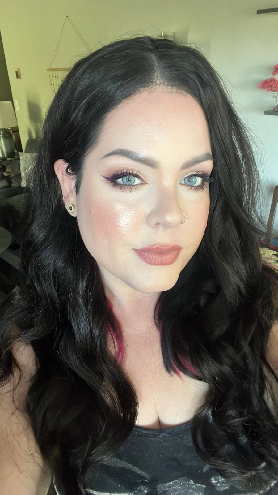 Customer showing a precise winged eyeliner look